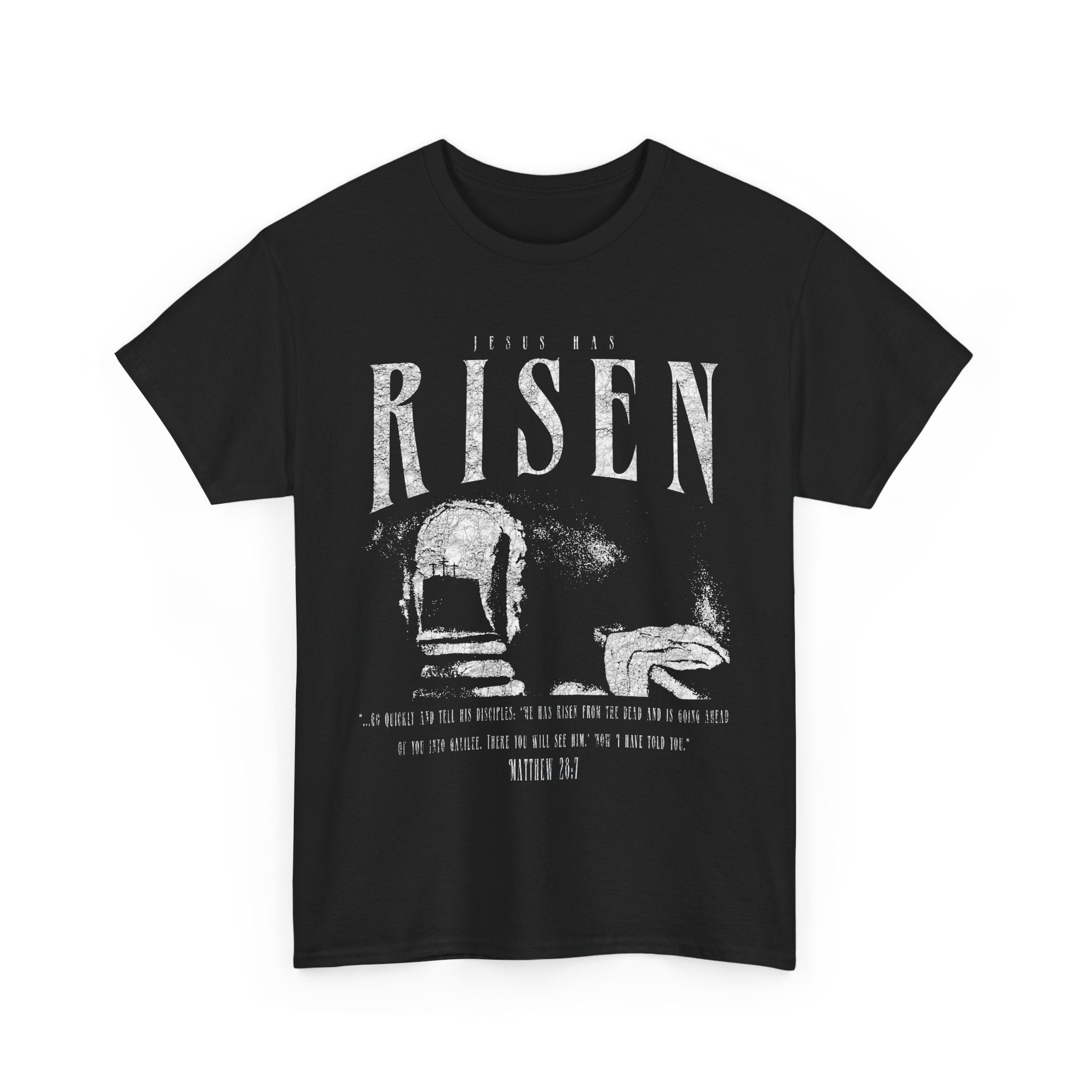 Resurrection-themed Christian shirt flatlay with empty tomb artwork and bold risen text